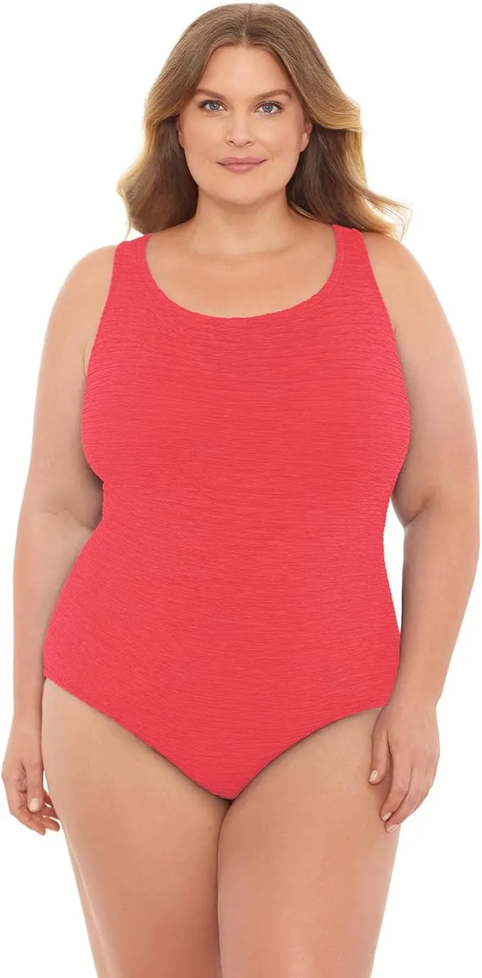 Plus size one-piece swimsuit with supportive cross-back straps and textured krinkle fabric.